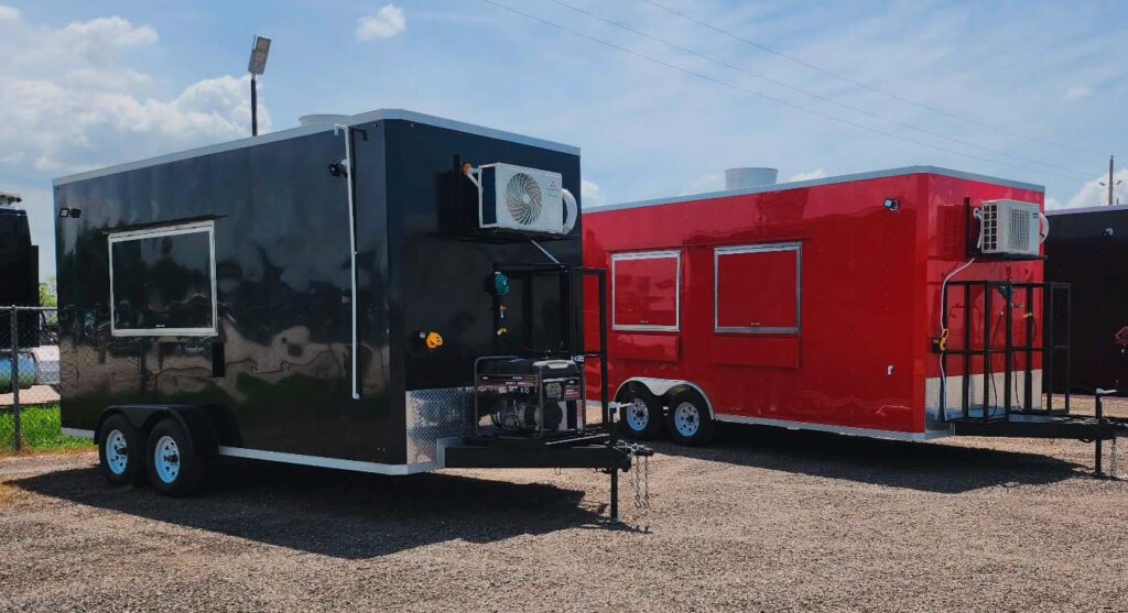 Two food trailers, one red and one black