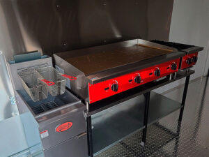 Grill and deep fryer inside a food truck