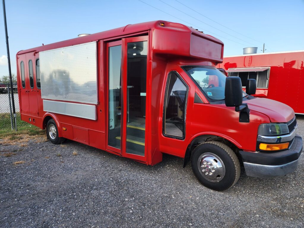 Dark-colored food truck seen from outside.